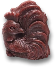 Sculpture de coq en grenat pyrope