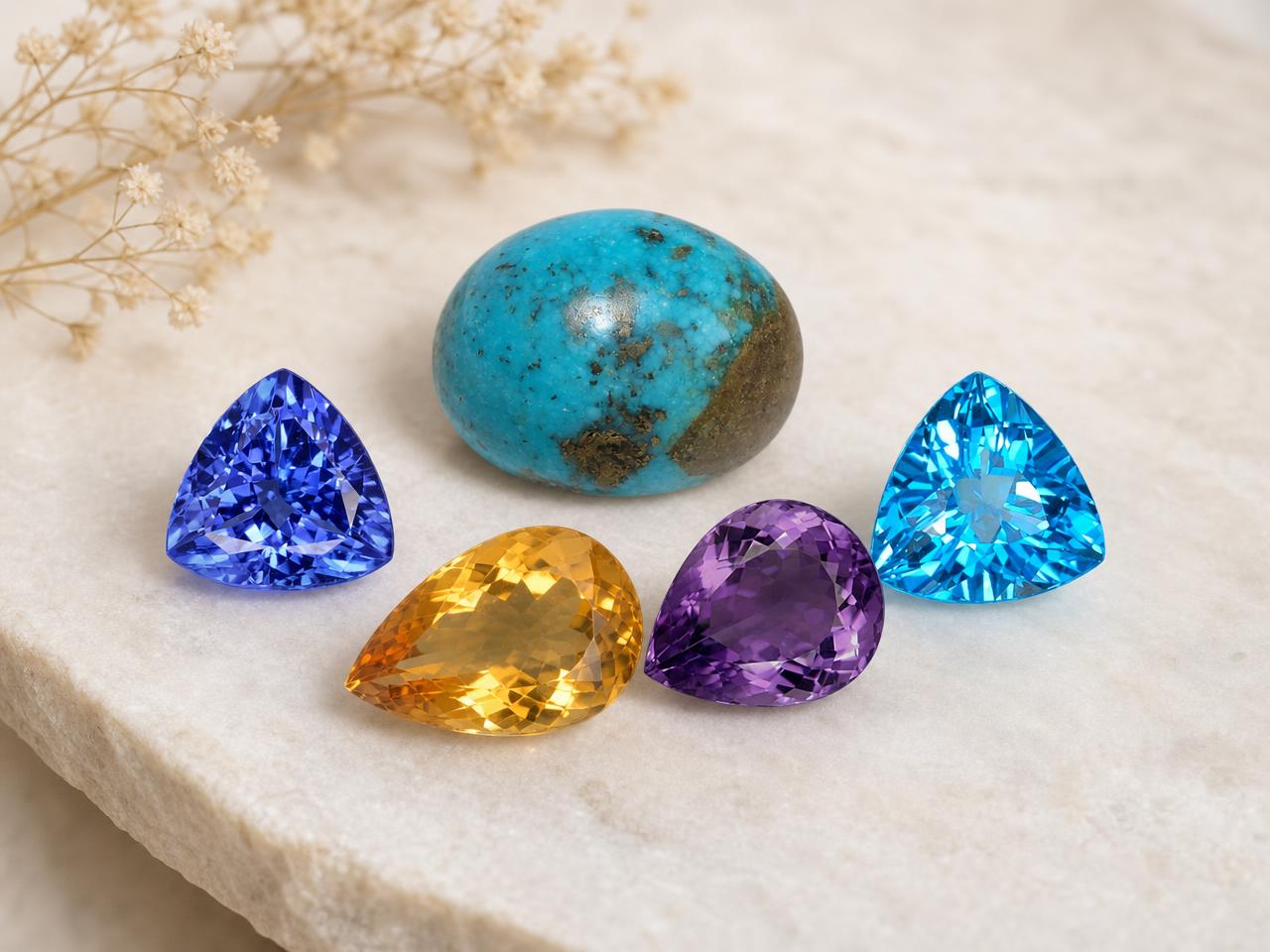 Pierres de naissance du Sagittaire en vrac, de couleur bleue, turquoise et dorée