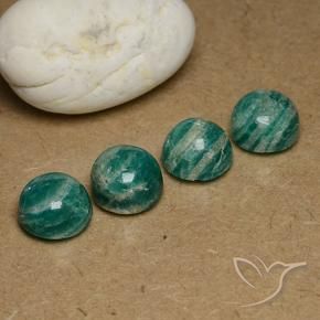 Shop natural 19.20ct Vert moyen-foncé Amazonite gems, Tour, from Madagascar at GemSelect. In stock, global shipping!