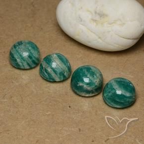 Shop natural 19.20ct Vert moyen-foncé Amazonite gems, Tour, from Madagascar at GemSelect. In stock, global shipping!
