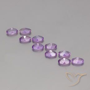 Shop natural 3.87ct Violet rosâtre moyen Améthyste gems, ovale, from Brésil at GemSelect. In stock, global shipping!