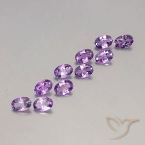 Shop natural 3.79ct Violet rosâtre moyen Améthyste gems, ovale, from Brésil at GemSelect. In stock, global shipping!