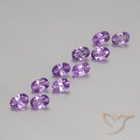 Shop natural 3.95ct Violet rosâtre moyen Améthyste gems, ovale, from Brésil at GemSelect. In stock, global shipping!