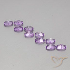 Shop natural 3.95ct Violet rosâtre moyen Améthyste gems, ovale, from Brésil at GemSelect. In stock, global shipping!
