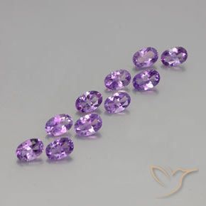 Shop natural 3.91ct Pourpre violacé moyen Améthyste gems, ovale, from Brésil at GemSelect. In stock, global shipping!