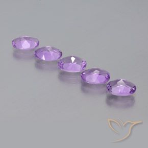 Shop natural 3.40ct Violet rosâtre moyen Améthyste gems, ovale, from Brésil at GemSelect. In stock, global shipping!
