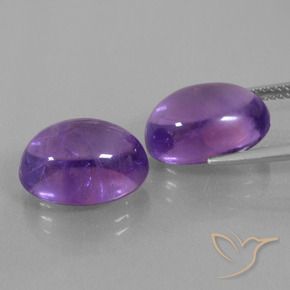 Shop natural 14.65ct Violet rougeâtre Améthyste gems, ovale, from Brésil at GemSelect. In stock, global shipping!