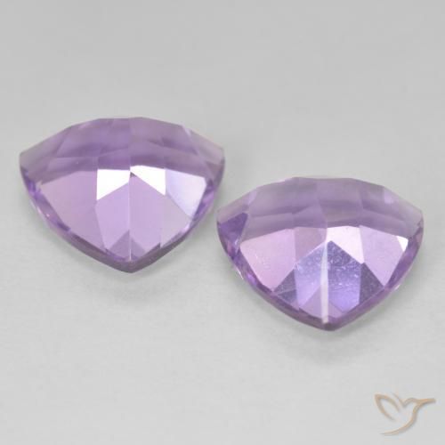 Shop natural 5.70ct Violet Rosâtre Améthyste gems, Trillion, from Brésil at GemSelect. In stock, global shipping!