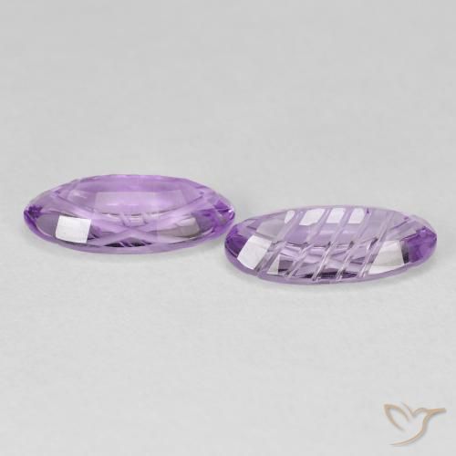Shop natural 3.46ct Violet rose vif Améthyste gems, ovale, from Brésil at GemSelect. In stock, global shipping!