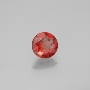 Andésine labradorite orange naturelle coupe roude, 0,65 ct, VS