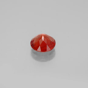 Andésine labradorite orange naturelle coupe roude, 0,65 ct, VS