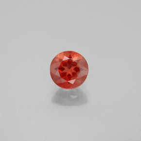 Andésine labradorite orange naturelle coupe roude, 0,65 ct, VS