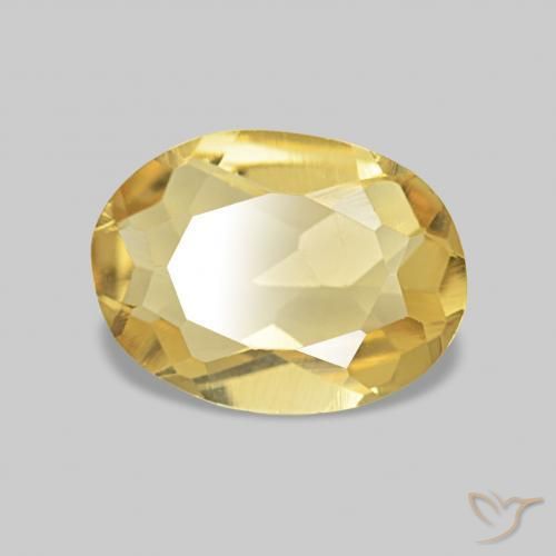 Béryl Orange Doré naturelle ovale, 0.99 ct, VS