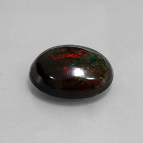 Opale noire multicolore naturelle coupe ovale, 8,82 ct, opaque