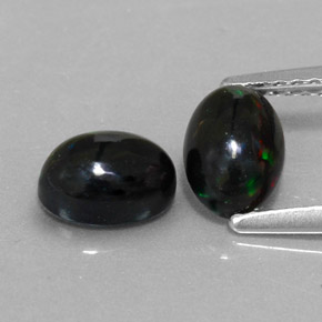 Achetez naturel ct multicolore opale noire gems, coupe ovale, en provenance ethiopie chez gemselect. en stock, livraison internationale!