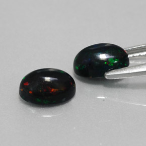 Achetez naturel ct multicolore opale noire gems, coupe ovale, en provenance ethiopie chez gemselect. en stock, livraison internationale!