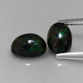 Achetez naturel ct multicolore opale noire gems, coupe ovale, en provenance ethiopie chez gemselect. en stock, livraison internationale!