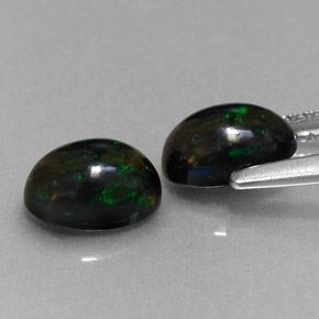 Achetez naturel ct multicolore opale noire gems, coupe ovale, en provenance ethiopie chez gemselect. en stock, livraison internationale!