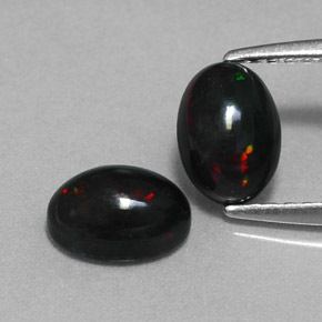 Achetez naturel ct multicolore opale noire gems, coupe ovale, en provenance ethiopie chez gemselect. en stock, livraison internationale!