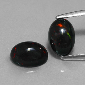 Achetez naturel ct multicolore opale noire gems, coupe ovale, en provenance ethiopie chez gemselect. en stock, livraison internationale!
