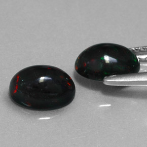 Achetez naturel ct multicolore opale noire gems, coupe ovale, en provenance ethiopie chez gemselect. en stock, livraison internationale!