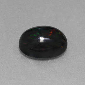 Opale noire multicolore naturelle coupe ovale, 1,27 ct, opaque