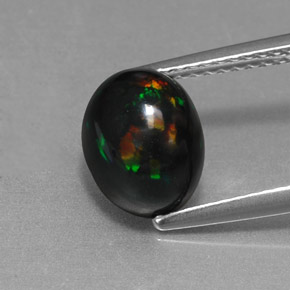 Opale noire multicolore naturelle coupe ovale, 1,58 ct, opaque