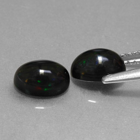 Achetez naturel ct multicolore opale noire gems, coupe ovale, en provenance ethiopie chez gemselect. en stock, livraison internationale!