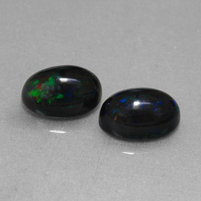 Achetez naturel ct multicolore opale noire gems, coupe ovale, en provenance ethiopie chez gemselect. en stock, livraison internationale!