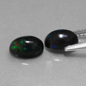 Achetez naturel ct multicolore opale noire gems, coupe ovale, en provenance ethiopie chez gemselect. en stock, livraison internationale!