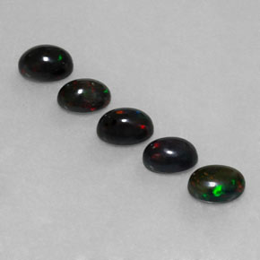 Achetez naturel ct multicolore opale noire gems, coupe ovale, en provenance ethiopie chez gemselect. en stock, livraison internationale!