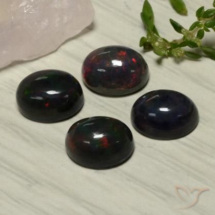 Achetez naturel 5,81ct rouge opale noire gems, coupe ovale, en provenance ethiopie chez gemselect. en stock, livraison internationale!