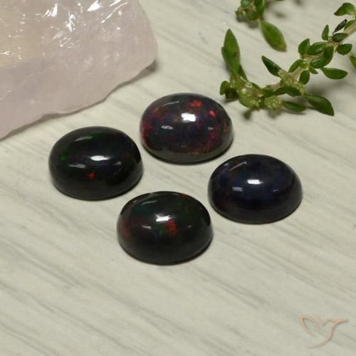 Achetez naturel 5,81ct rouge opale noire gems, coupe ovale, en provenance ethiopie chez gemselect. en stock, livraison internationale!