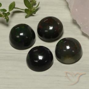 Shop natural 6.38ct Multicolore Opale noire gems, Tour, from Ethiopie at GemSelect. In stock, global shipping!