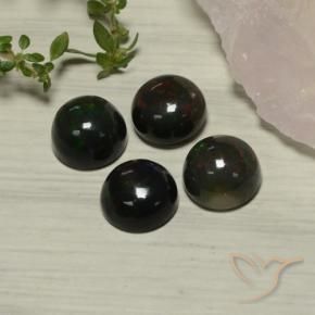 Shop natural 6.38ct Multicolore Opale noire gems, Tour, from Ethiopie at GemSelect. In stock, global shipping!
