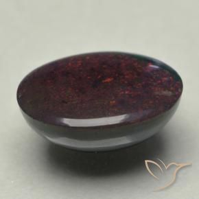 Opale noire multicolore naturelle coupe ovale, 0,74 ct, opaque