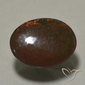 Opale noire multicolore naturelle coupe ovale, 0,89 ct, opaque
