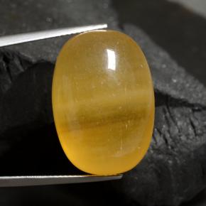 Calcite orange naturelle coupe ovale, 40,17 ct, translucide