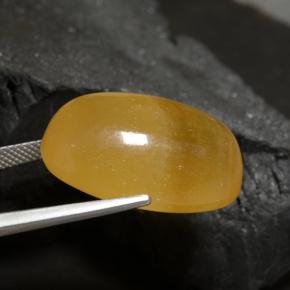Calcite orange naturelle coupe ovale, 40,17 ct, translucide