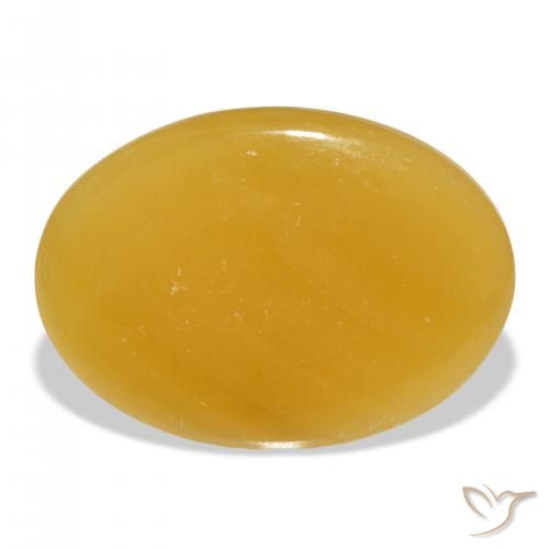 47.69ct Naturel Orange doré calcite, ovale, Translucide, Photo A