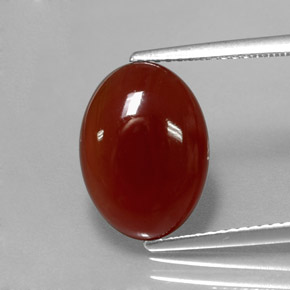 Cornaline orange naturelle coupe ovale, 5,28 ct, translucide
