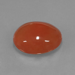 Cornaline orange naturelle coupe ovale, 3,92 ct, translucide