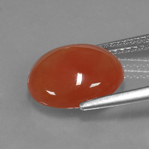 Cornaline orange naturelle coupe ovale, 3,92 ct, translucide