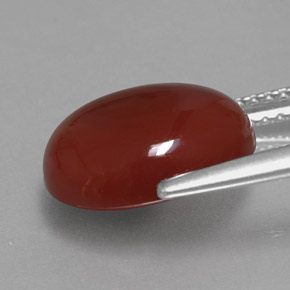 Cornaline rouge naturelle coupe ovale, 4,71 ct, translucide