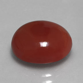 Cornaline orange naturelle coupe ovale, 6,11 ct, translucide