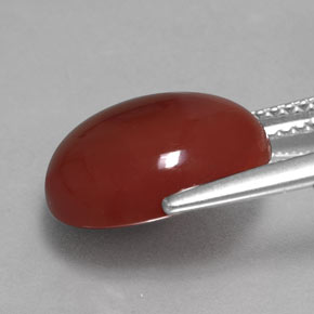 Cornaline orange naturelle coupe ovale, 6,11 ct, translucide