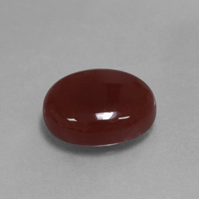 Cornaline marron naturelle coupe ovale, 5,81 ct, translucide