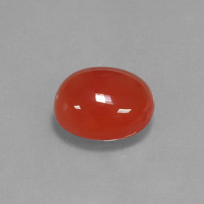 Cornaline orange naturelle coupe ovale, 3,68 ct, translucide