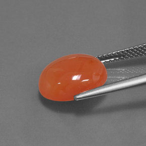 Cornaline orange naturelle coupe ovale, 4,71 ct, translucide