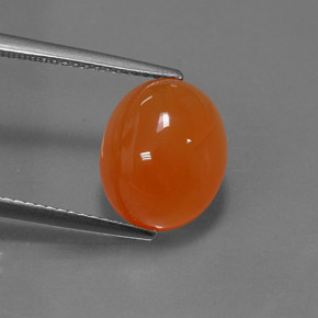 Cornaline orange naturelle coupe ovale, 5,07 ct, translucide